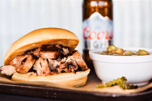 Joe's Kansas City Bar-B-Que signature dishes Pulled Pork, Brisket, The Z-Man.